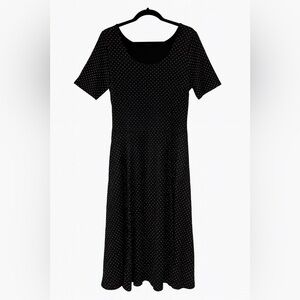 Ronni Nicole size 10 petite slip-on black dress with white polka dots.